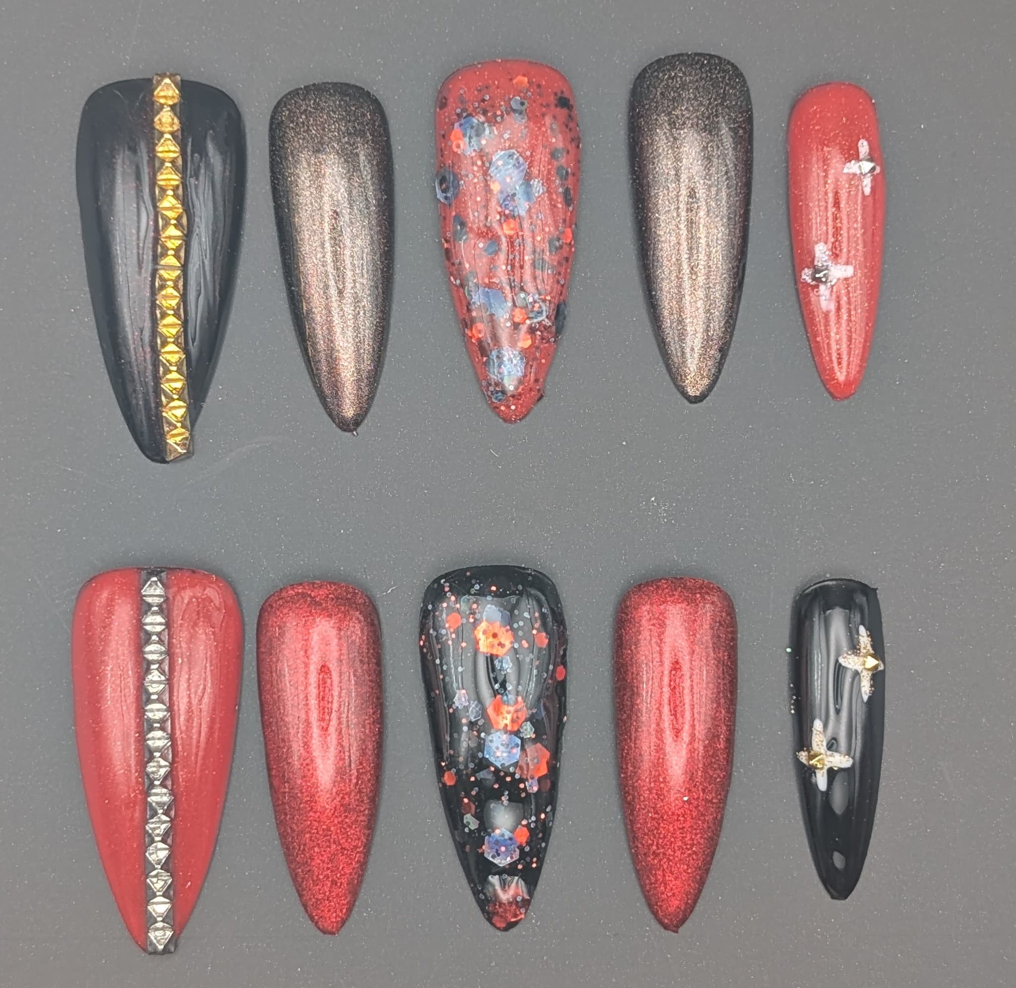 Hand-painted press-on nail set: Crimson Eclipse by The Nail Eclipse Club